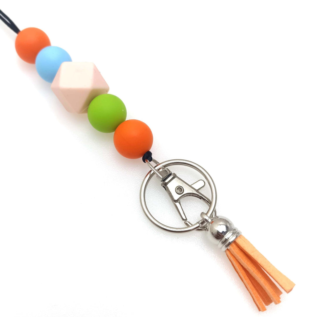 Eye-catching silicone beaded keychain, a durable and colorful accessory for keys or bags.