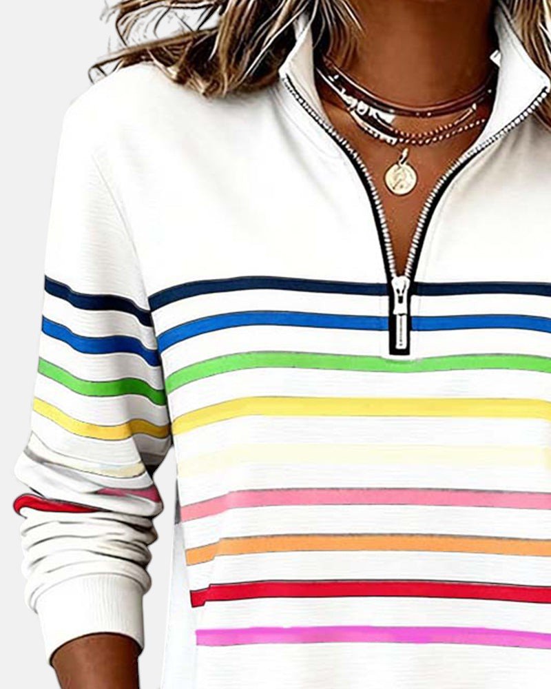 Comfortable women's striped jumper with a quarter zip neckline, perfect for layering.