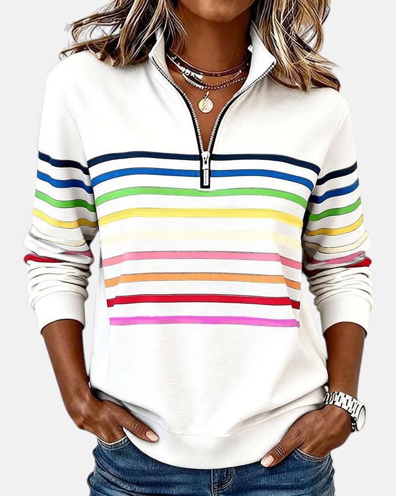 Vibrant women's striped quarter zip jumper, ideal for comfy and stylish autumn outfits.