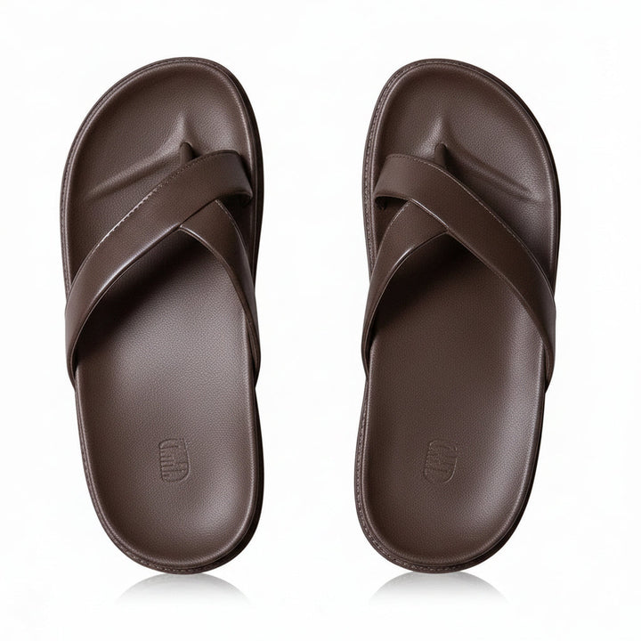 Close-up of pink crisscross platform slippers for women, perfect for summer comfort.