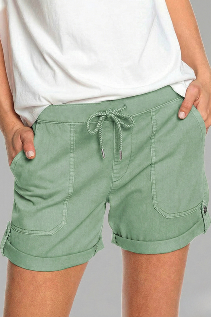 Detail of the drawstring and pocket on women's casual summer shorts for ladies.
