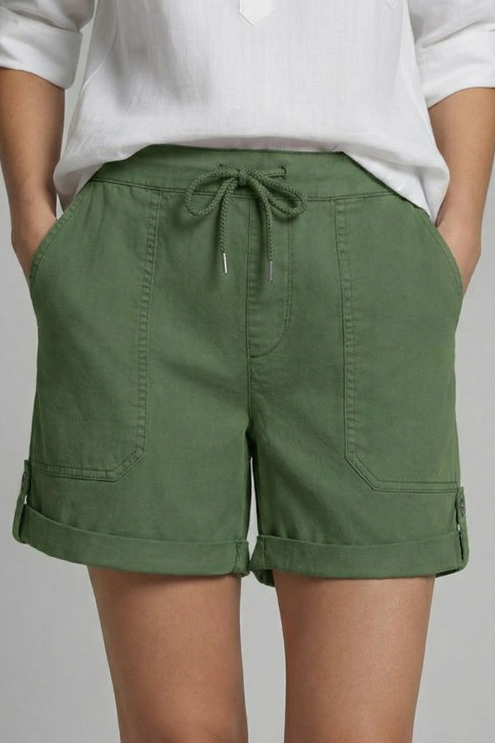 Lifestyle shot: woman enjoying summer in comfortable casual drawstring pocket shorts.