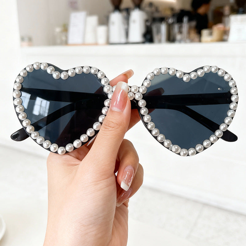 Chic Heart Pearl Accent Sunglasses, suitable for stylish women, essential fashion accessory.