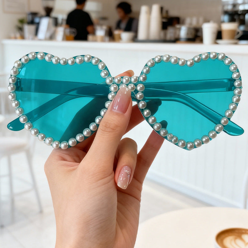 Women's UV protection Heart Sunglasses with decorative pearl accents, summer essential.