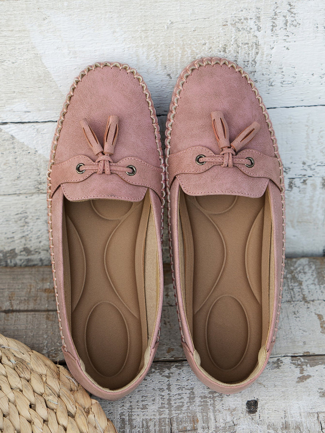Women's fashion comfort footwear: black orthopedic tassel loafers with arch support.