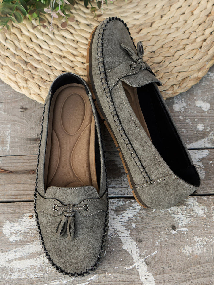 Comfortable & elegant women's orthopedic tassel loafers, perfect for everyday style.