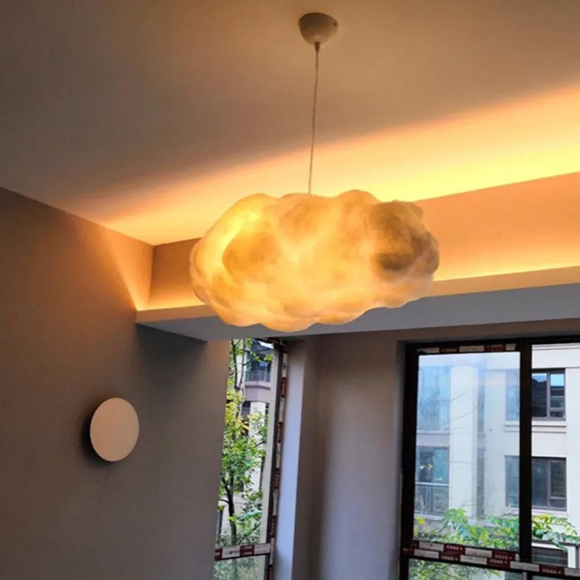Textured cloud pendant light, artistic ceiling lamp ideal for modern living rooms and dining areas.