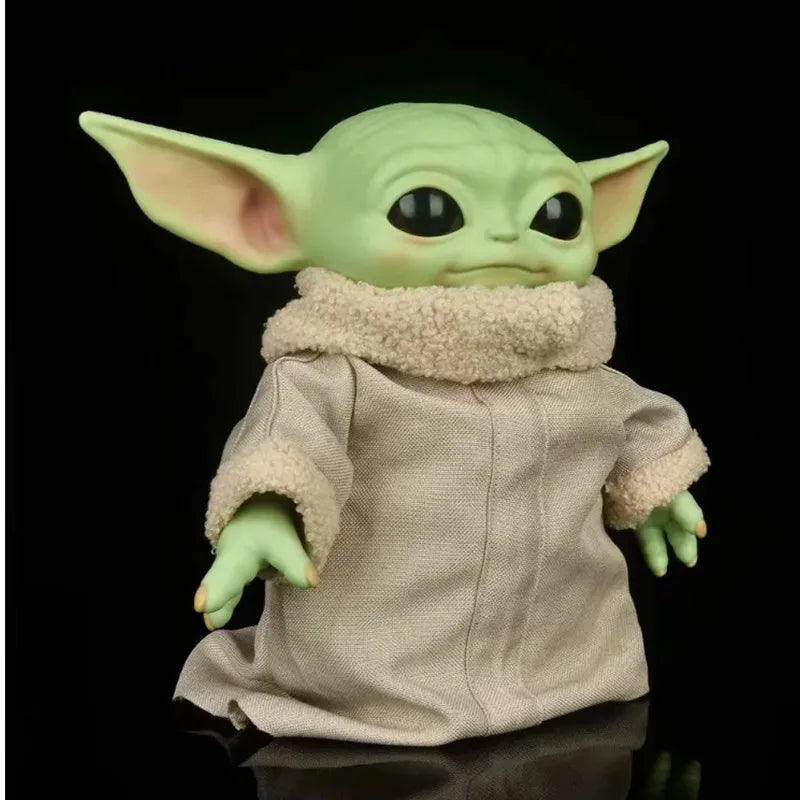 Baby Yoda Grogu action figure, an enchanting Star Wars toy for kids. Perfect galactic adventure gift for fans.