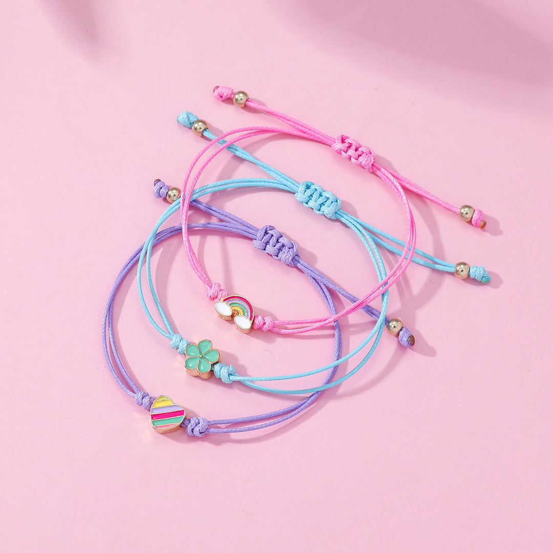 Colorful 4-piece adjustable friendship bracelet set for women, with charming designs. Ideal friendship gift.