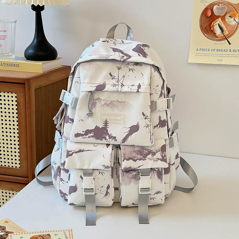 Colorful art-inspired unisex adventure backpack with unique design, durable for travel & casual use.