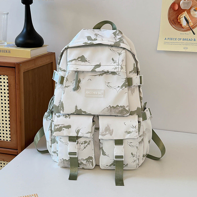 Durable unisex adventure travel backpack, featuring a vibrant art design, perfect as a stylish daypack.