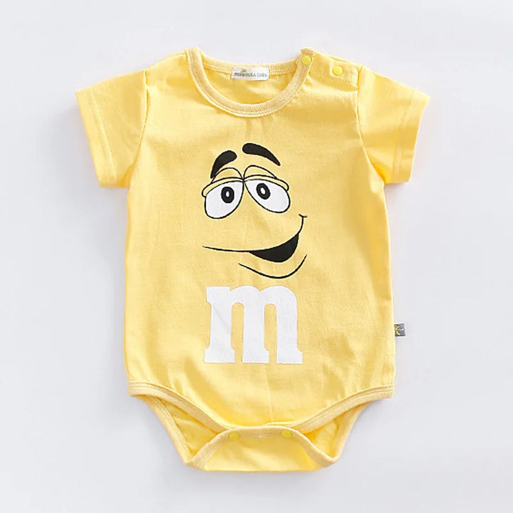 Vibrant M&M faces baby romper. Soft, short sleeve infant & toddler clothing with easy snap closure for casual playtime.
