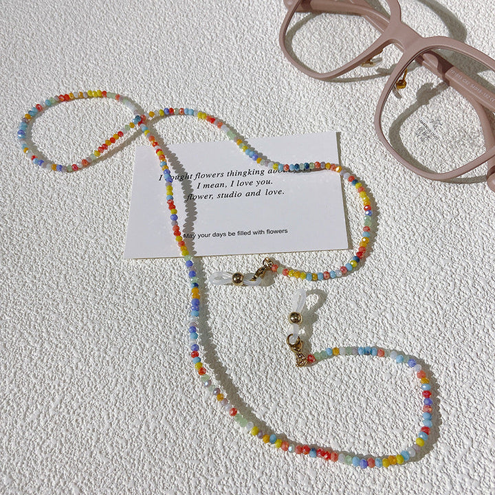 Fashionable multicolored bead glasses chain, secure eyewear holder. Stylish accessory for spectacles.