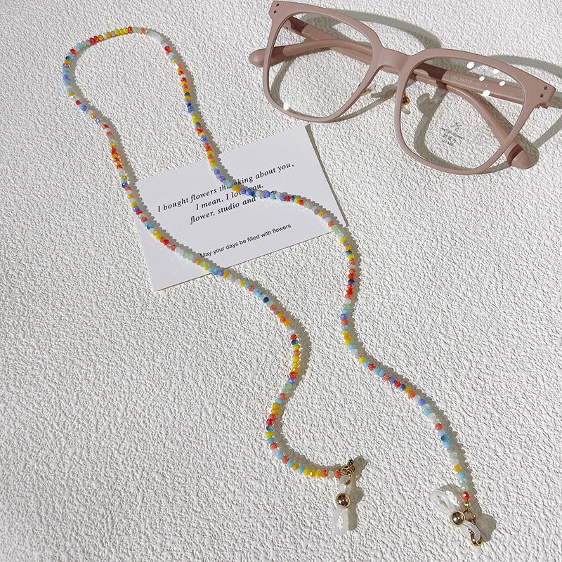 Secure & stylish colorful bead glasses chain. A vibrant, multi-colored eyewear holder for everyday fashion.