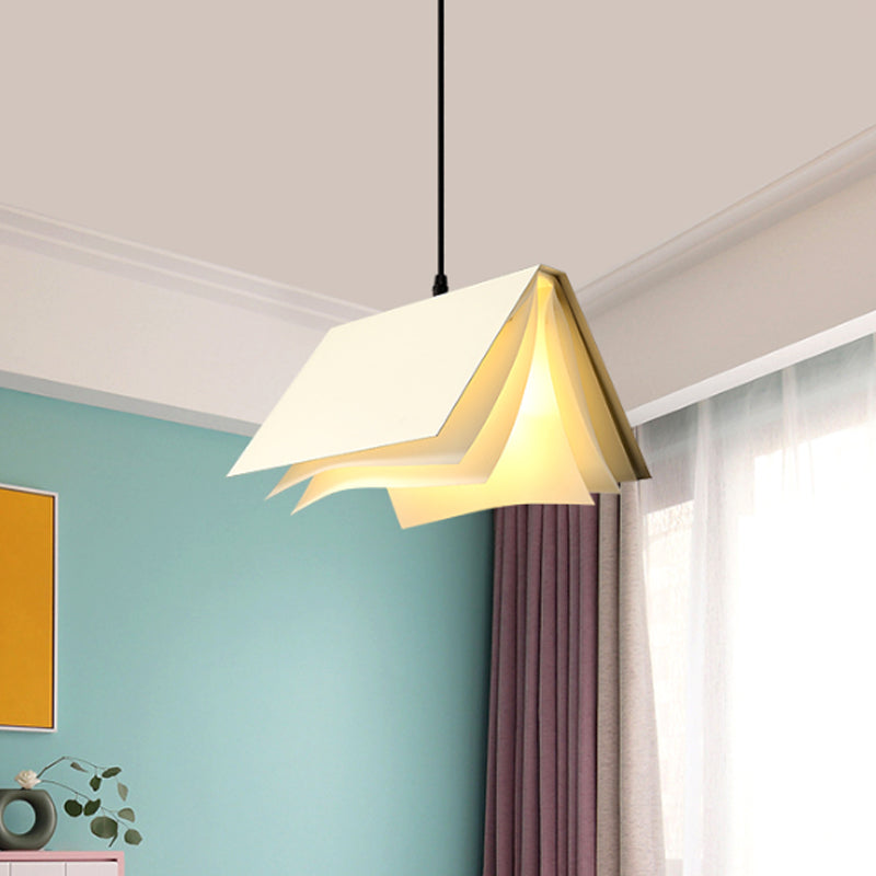 Playroom book-inspired pendant light, a whimsical and colorful ceiling fixture.
