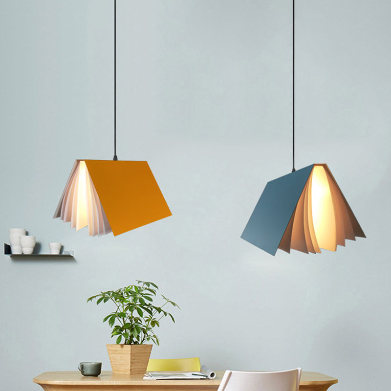Book-inspired decorative pendant light, a bright accent for children's lighting.