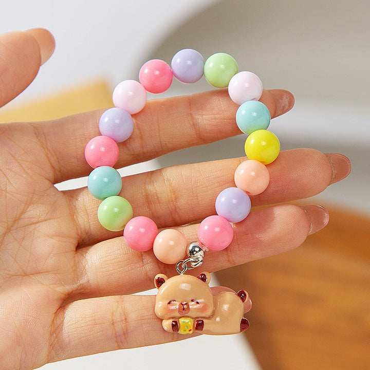 Ideal birthday gift: Colorful kids' charm bracelet, adjustable for a perfect fit, fun plastic beads.