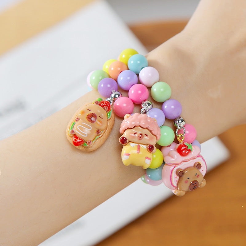 Girls' colorful charm bracelet, fun kids jewelry with plastic animal beads, adjustable fit.