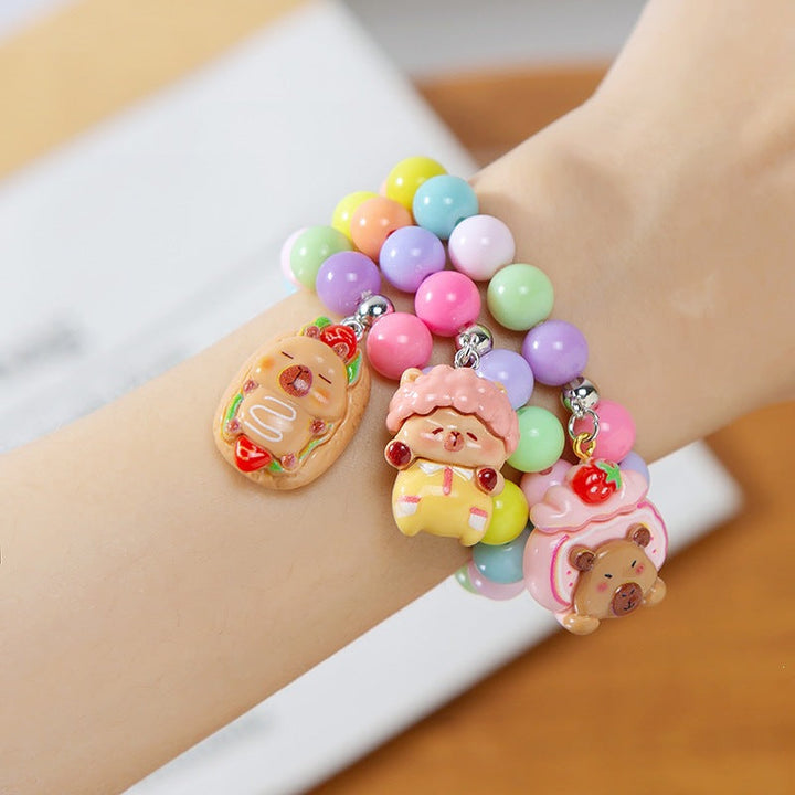 Girls' colorful charm bracelet, fun kids jewelry with plastic animal beads, adjustable fit.