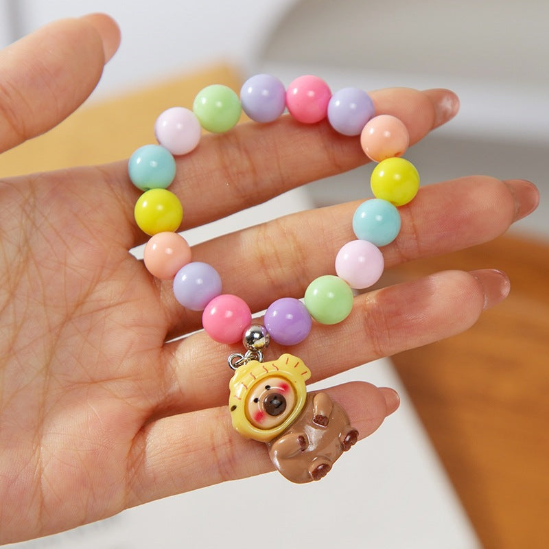 Playful adjustable kids' charm bracelet, colorful plastic beads for girls & boys, fun jewelry.