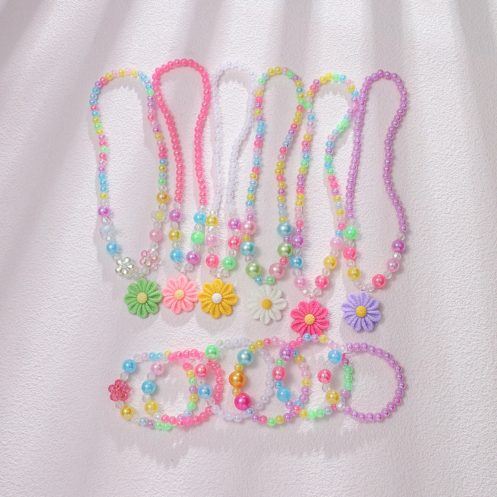 Girls' flower pendant necklace and matching colorful beaded bracelet, children's jewelry set.