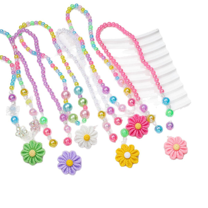 Complete girls' colorful flower pendant necklace & beaded bracelet matching jewelry set.