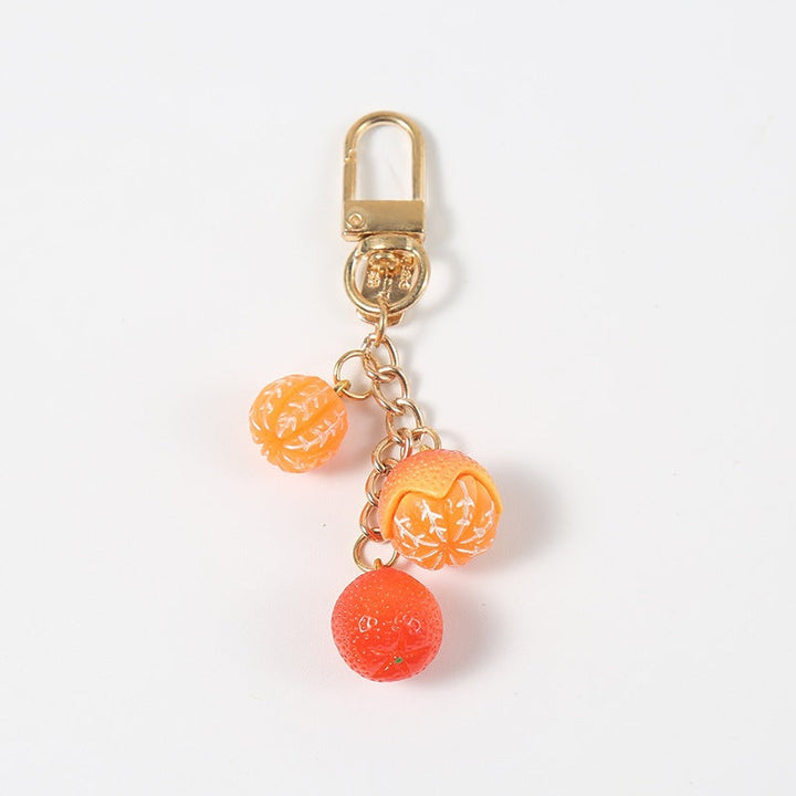 Cute fruity design keychain, a colorful gift idea and stylish bag charm for keys or backpacks.