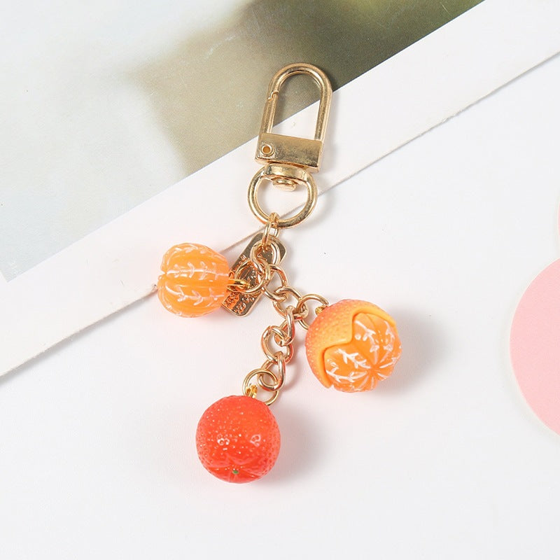 Durable fruity keychain for bags & keys. A vibrant, playful fashion accessory & purse charm.