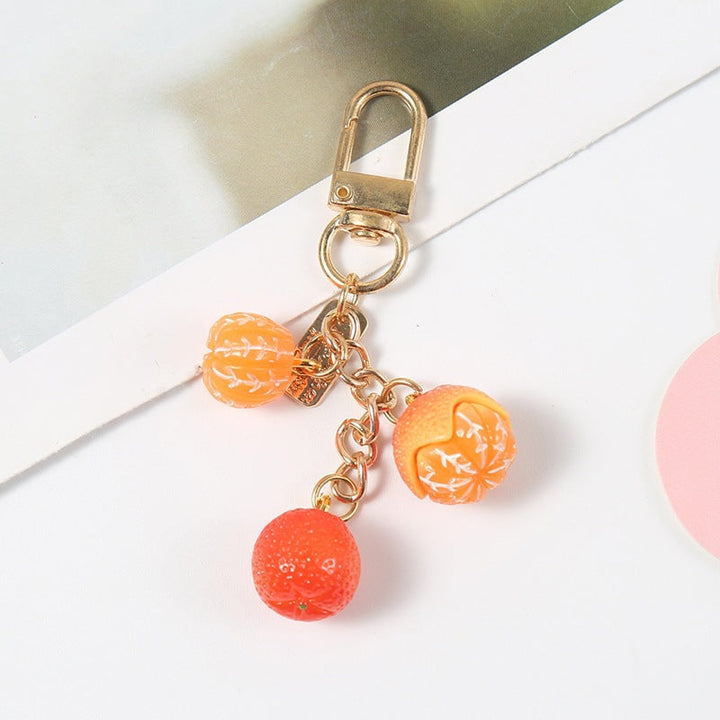 Durable fruity keychain for bags & keys. A vibrant, playful fashion accessory & purse charm.