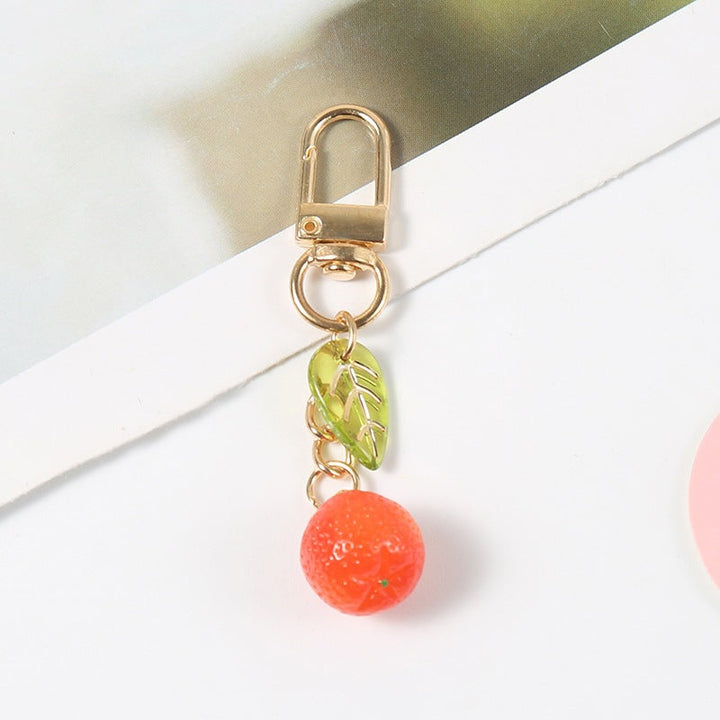 Colorful fruit pattern keychain, an attractive bag charm and key holder, perfect fashion accessory.
