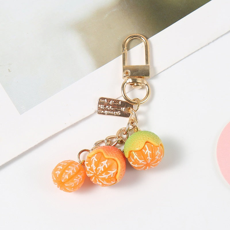 Unique fruity design keychain, a playful and vibrant purse accessory and key holder. Great gift.
