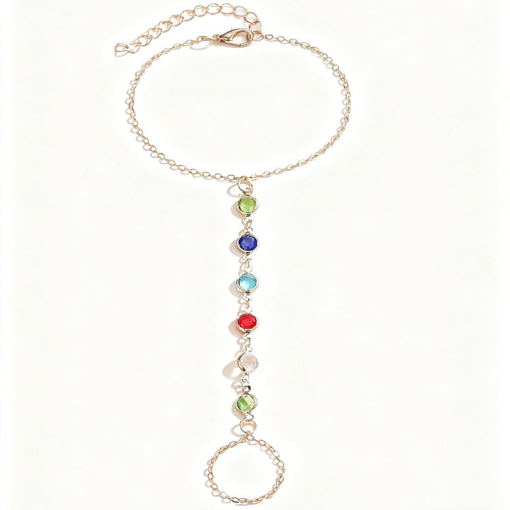 A women's colorful gemstone charm bracelet displayed as a perfect gift. Fashionable, elegant, and adjustable.