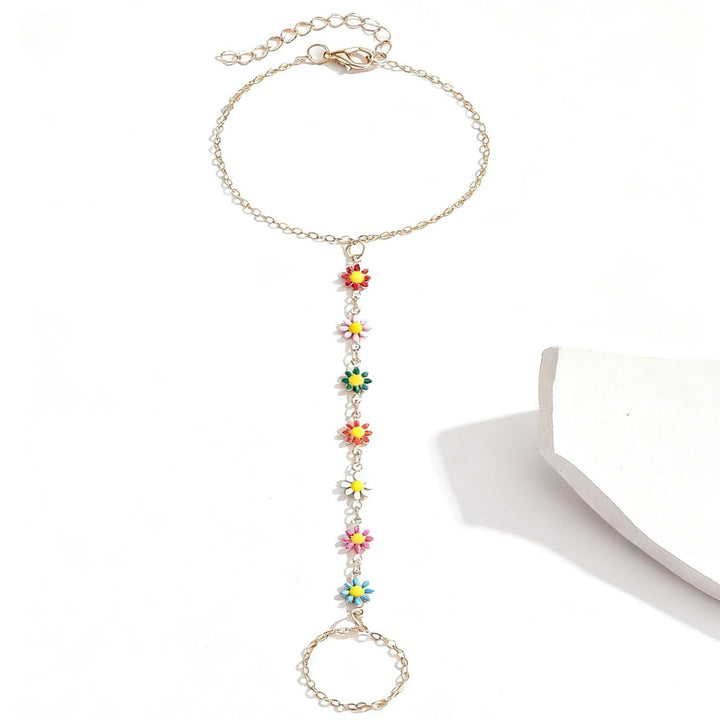 Brightly colored gemstone bracelet with various charms for women. Adjustable fashion jewelry, elegant design.