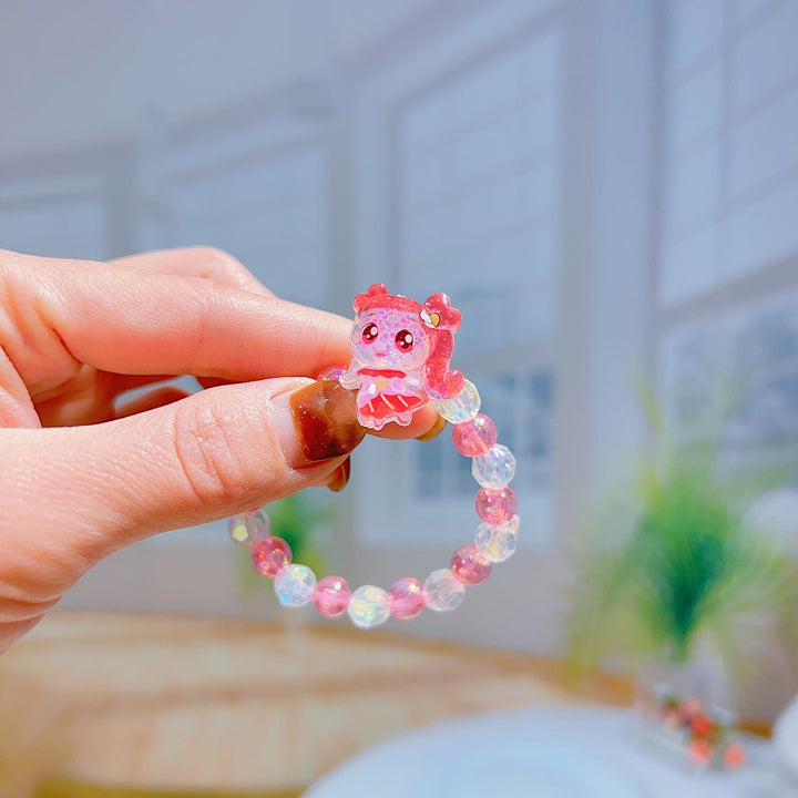 Colorful girls' cartoon charm bracelet, adjustable and elastic, featuring fun playful characters.