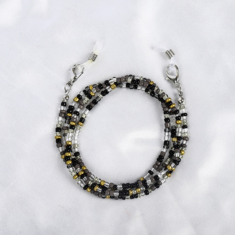 Eye-catching colorful beaded unisex fashion accessory necklace with a secure carabiner clasp. Glass beads.