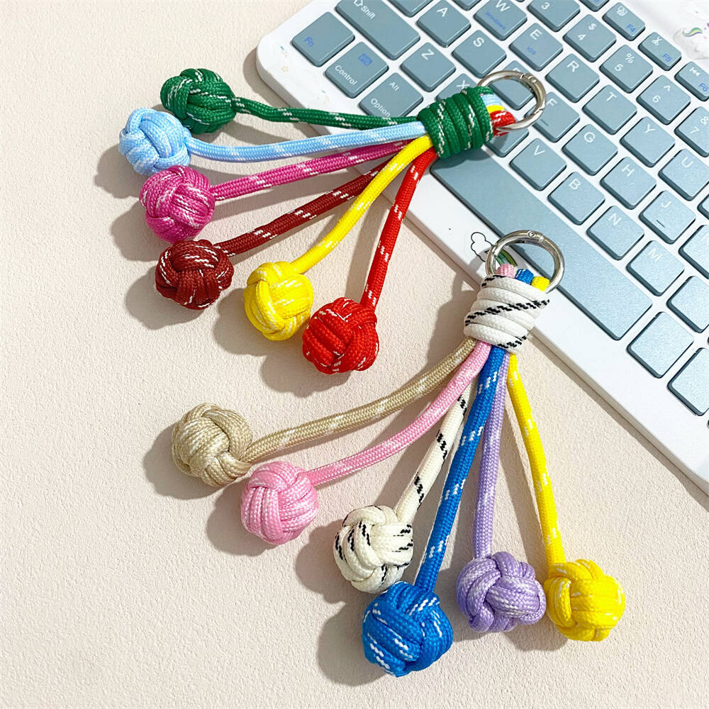 Colorful knot keychain, stylish bag charm, durable key holder accessory for keys and bags.