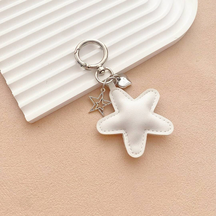 Playful leather starfish bag accessory, a colorful and stylish keychain for unique individuals.