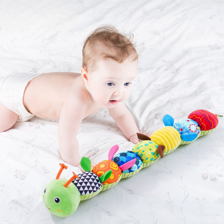 Interactive musical caterpillar plush toy with vibrant colors, aiding infant sensory & motor skill development.