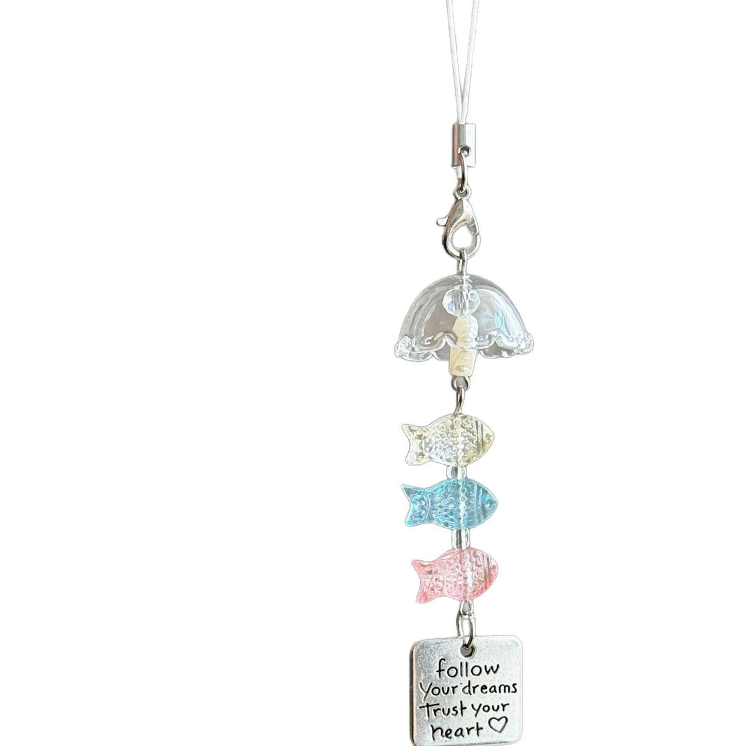 Assorted nautical ocean life charms on a plastic keychain, ideal as a fun accessory or souvenir.