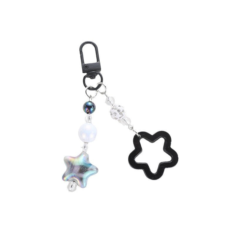 Adorable floral star bag charm, a playful & stylish accessory for keys or bags.
