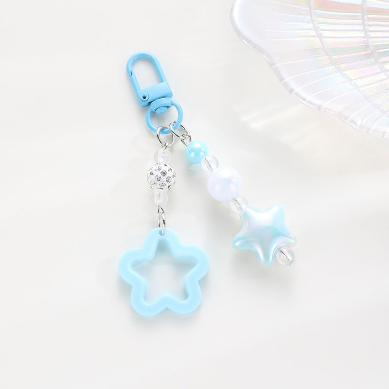 Perfect gift: colorful floral star keychain, a trendy keyholder & bag charm.