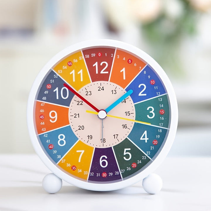 Colorful silent educational alarm clock for children, helping students learn time in their room.