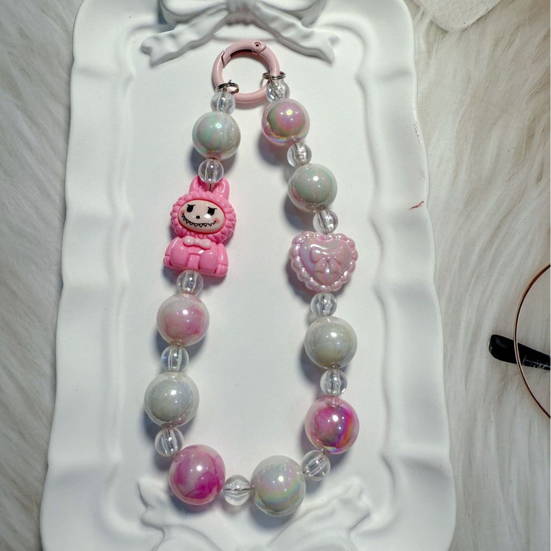 Personal whimsical beaded charm, ideal for bags, keys, or as a unique decorative gift.