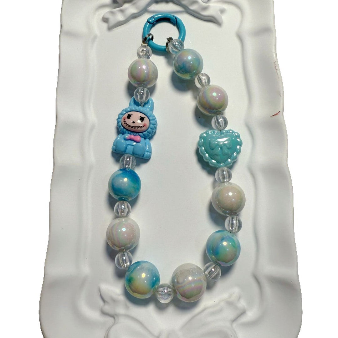 Vibrant multi-color beaded charm, handcrafted style accessory for bags & key organization.