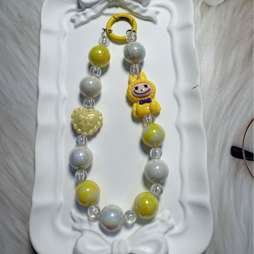 Eye-catching whimsical beaded keychain & bag charm, unique, colorful, & decorative.