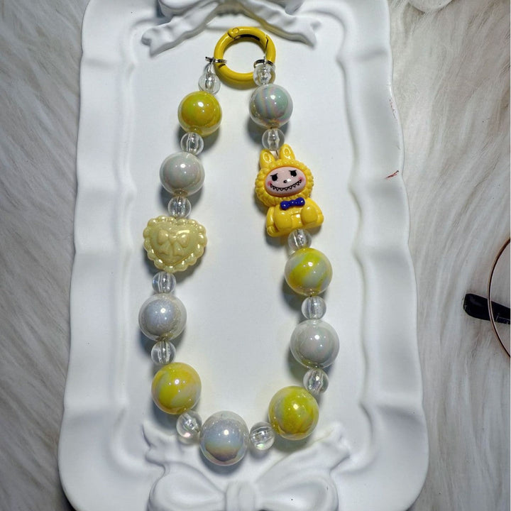 Eye-catching whimsical beaded keychain & bag charm, unique, colorful, & decorative.
