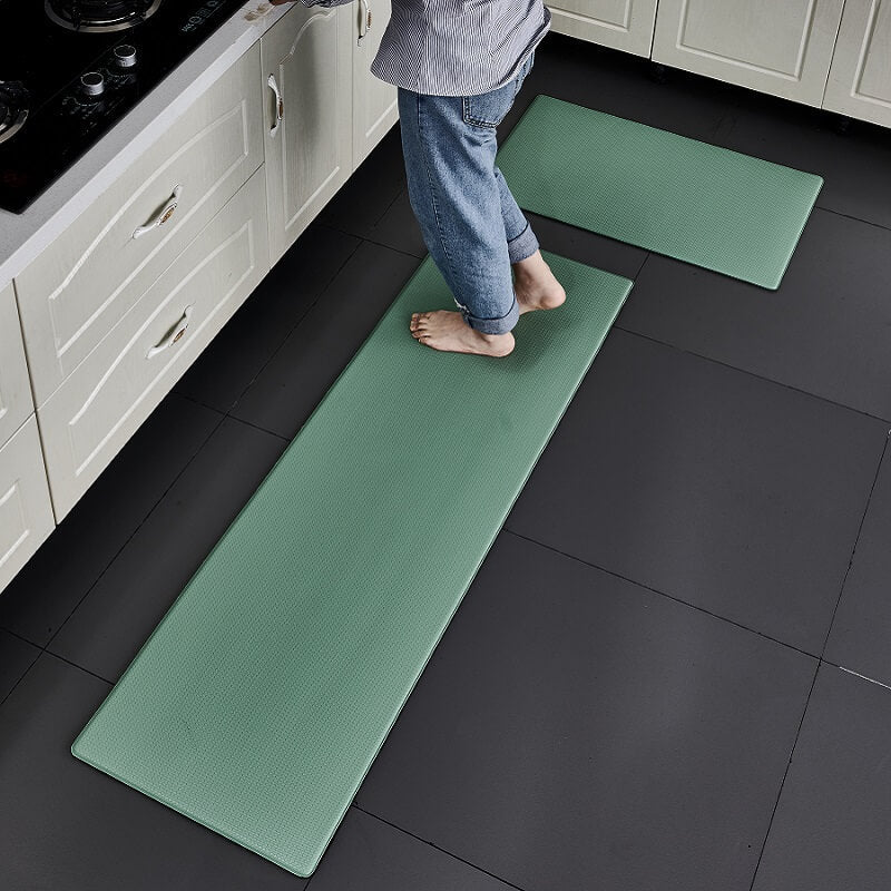 Functional kitchen mat, anti-slip backing, waterproof surface, and ultimate comfort cushioning.