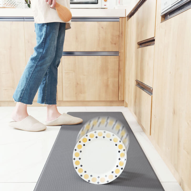 Stylish kitchen floor mat with anti-slip backing, waterproof surface & cushioned support.
