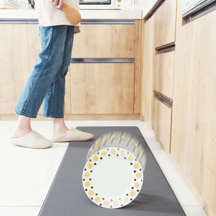 Stylish kitchen floor mat with anti-slip backing, waterproof surface & cushioned support.