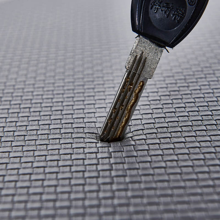 Waterproof kitchen mat, anti-slip & cushioned, perfect for high-traffic kitchen areas.